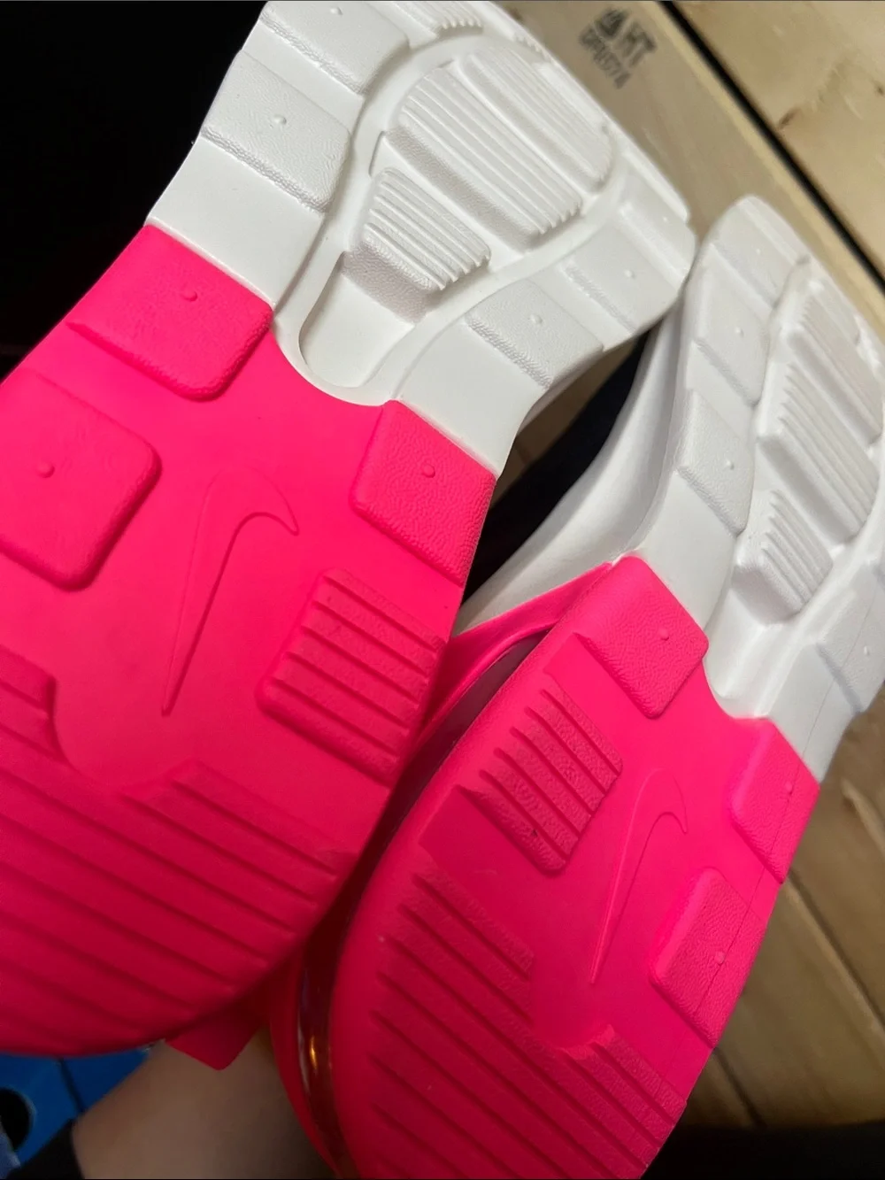 Nike Women's Black Sneaker with Blue Swoosh and Pink Heel